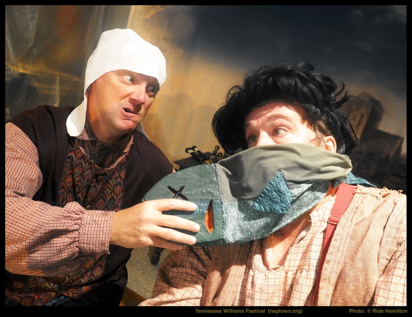(l to r) Jay Stewart as Serf, a fish as itself, and Mike Smith as Peasant in Stewart Family Entertainment’s <em>Dumb Show &am