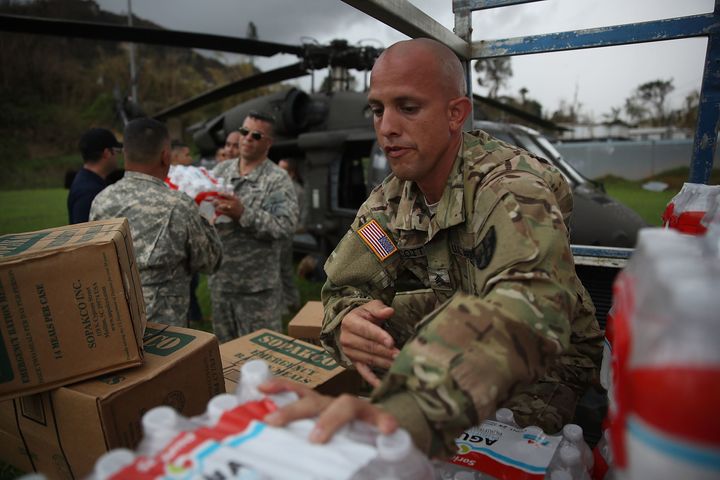September 29: The Puerto Rican National Guard deliver food and water via helicopter to hurricane survivors as they deal with the aftermath of Hurricane Maria.