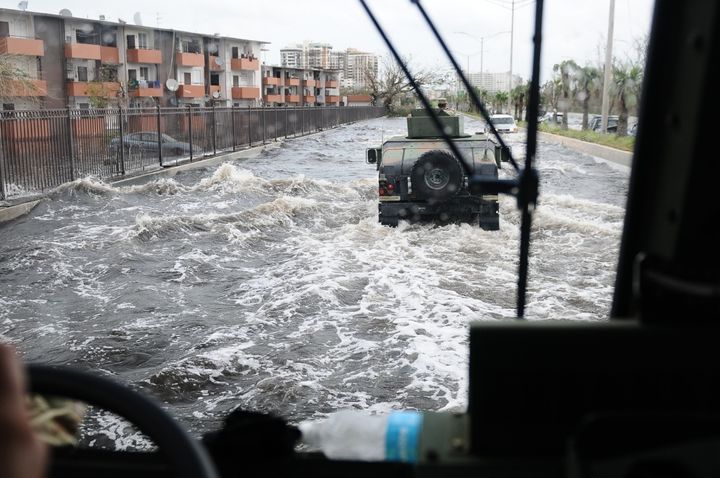 Citizen-Soldiers of the Puerto Rico National Guard patrol one of the main highway of the metropolitan area, affected by the flood after the Hurricane Maria.