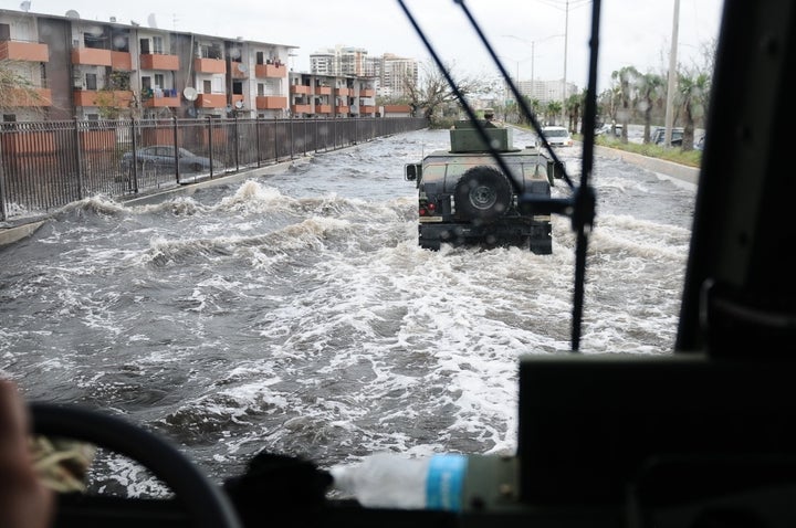 <p>Citizen-Soldiers of the Puerto Rico National Guard patrol one of the main highway of the metropolitan area, affected by the flood after the Hurricane Maria.</p>