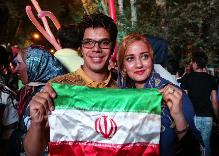 Iranians celebrate the nuclear agreement between Iran and the P5+1 world powers on July 14, 2015 in Tehran, Iran.