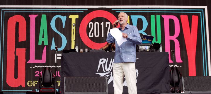 Labour leader Jeremy Corbyn speaks to the crowd from the Pyramid stage at Glastonbury Festival
