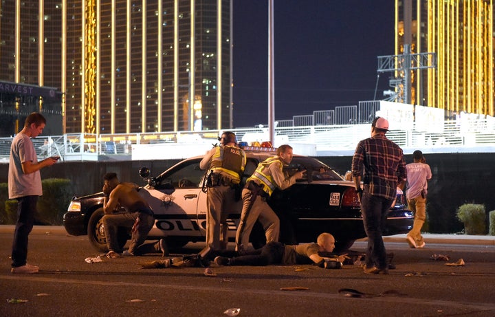 Police guard along the streets outside the the Route 91 Harvest country music festival grounds after a active shooter was reported on Monday