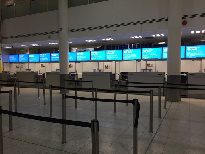 Deserted check-in desks at Gatwick Airport on Monday morning.