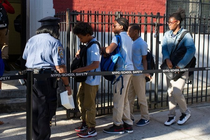  Younger students now have backpacks checked and are required to pass through metal detectors at the elementary school that shares a building Urban Assembly School for Wildlife Conservation. 