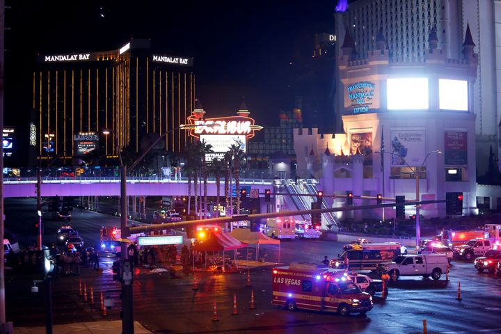 Las Vegas Metro Police and medical workers stage in the intersection of Tropicana Avenue and Las Vegas Boulevard South after a mass shooting at a music festival on the Las Vegas Strip in Las Vegas, Nevada