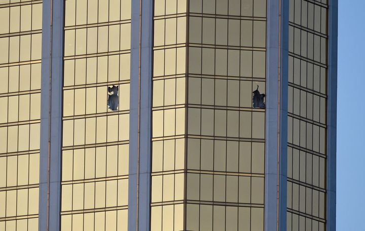 Broken windows are seen on the 32nd floor of the Mandalay Bay Resort and Casion where Paddock conducted his massacre 