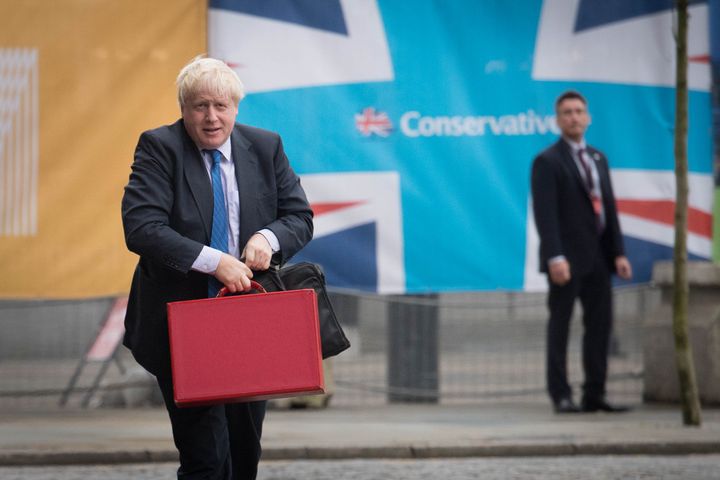Boris Johnson arrives at the Conservative Party Conference in Manchester