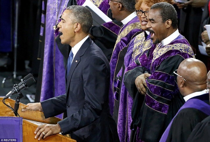 <p>President Obama, singing "Amazing Grace," at a memorial service in Charleston, South Carolina</p>
