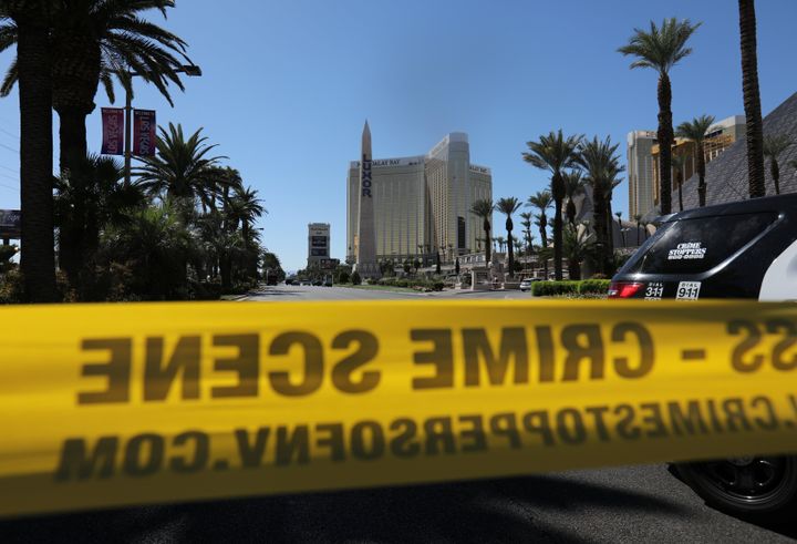 Police crime scene tape marks a perimeter outside the Luxor Las Vegas hotel and the Mandalay Bay Resort and Casino. 
