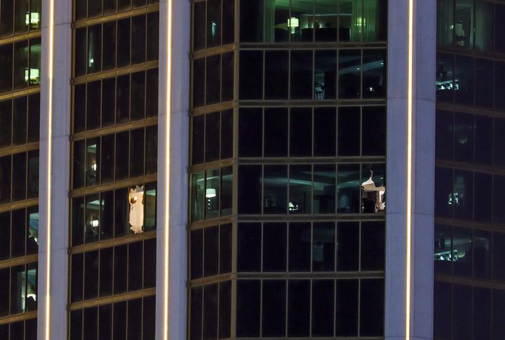 Police say Stephen Paddock smashed the windows of his suite to launch a barrage of gunfire on crowds below 