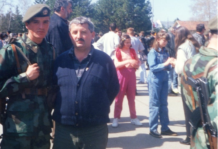 Freddy Lukovic with his uncle in Leskovac, Serbia, after a month of being in the military in 1998.