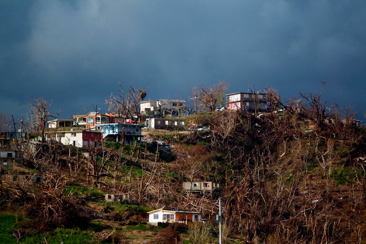 Damaged houses are seen atop a hill in the aftermath of Hurricane Maria in Yabucoa, Puerto Rico, on Oct. 2, 2017.