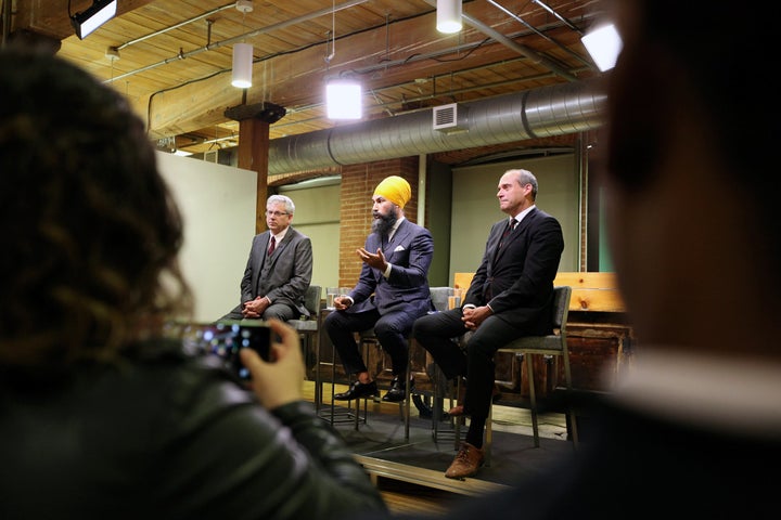 Jagmeet Singh, centre, went sockless during a NDP leadership debate hosted by HuffPost Canada on Sept. 27, 2017.