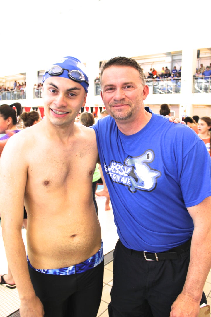Coach Mike McQuay and his son, Mikey.