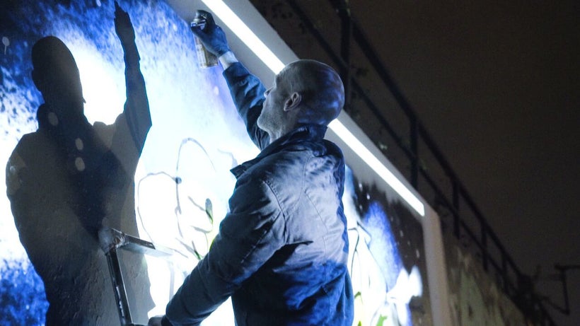 Ibo Omari / Berlin, Germany<em> painting his mural</em>