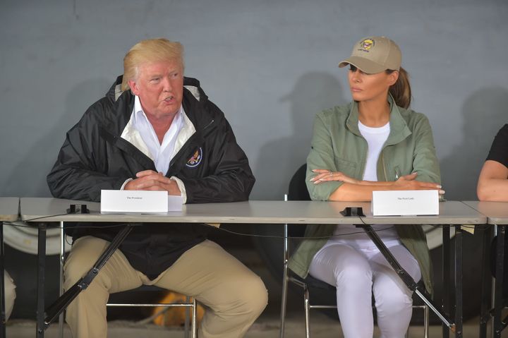 Donald Trump and Melania Trump attend a meeting with Puerto Rico officials.