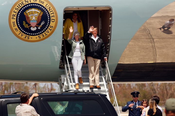 U.S. President Donald Trump and the first lady Melania Trump arrive at the Muniz Air National Guard Base in Puerto Rico on Tuesday.