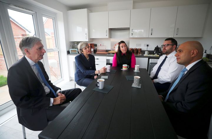 Theresa May and Chancellor Philip Hammond and Sajid Javid visit a 'Help to Buy' home in Salford.
