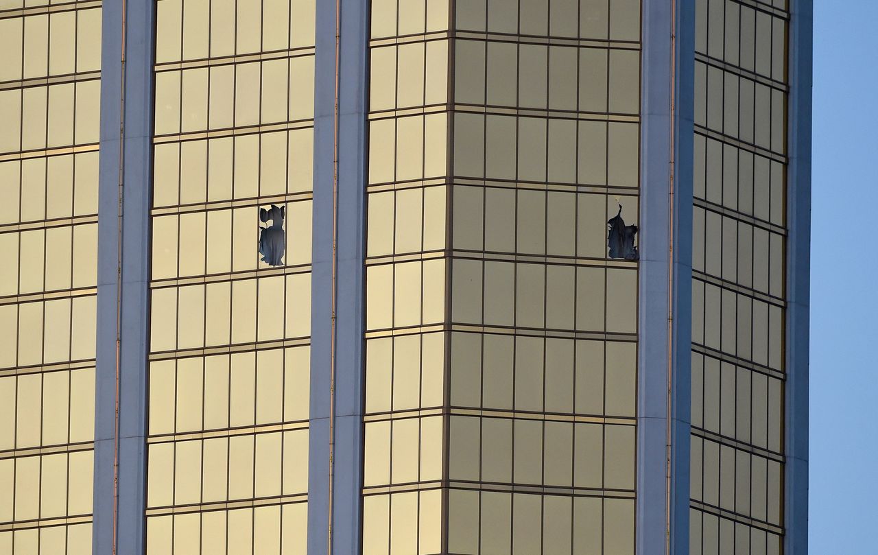 Broken windows are seen on the 32nd floor of the Mandalay Bay Resort and Casino.