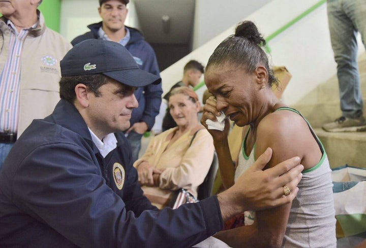 <p>Governor Ricardo Rosello with hurricane victims in Puerto Rico</p>