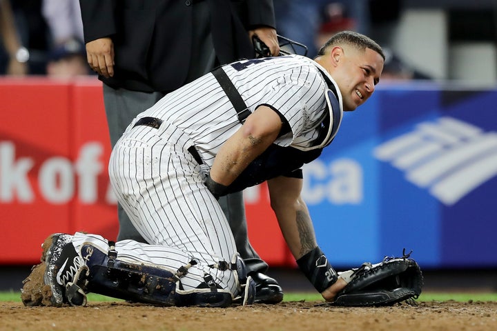 New York Yankees catcher Gary Sanchez doubles over in pain after taking a foul ball to his privates during a game agains