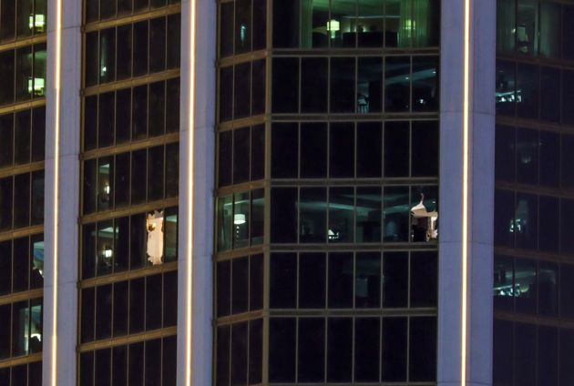 Police say Stephen Paddock smashed the windows of his suite to launch a barrage of gunfire on crowds below 