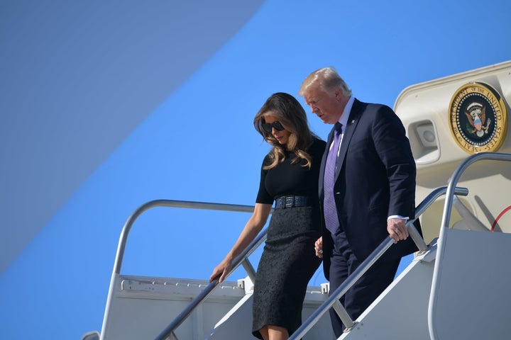 President Donald Trump and first lady Melania Trump step off Air Force One upon arrival at McCarran International Airport in