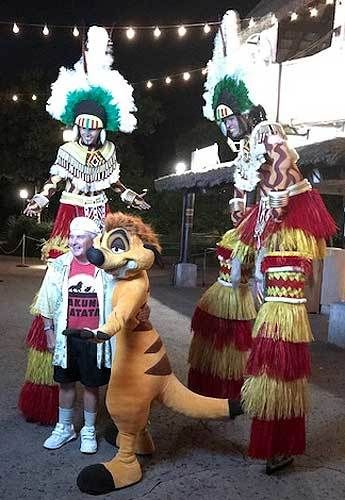 Ernie Sabella poses with WDW cast members after a recent performance of the “Festival of the Lion King” stage show.