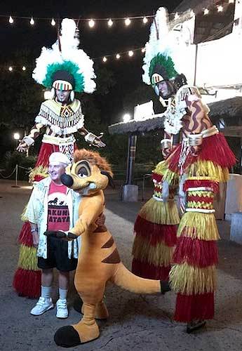 <p>Ernie Sabella poses with WDW cast members after a recent performance of the “Festival of the Lion King” stage show.</p>