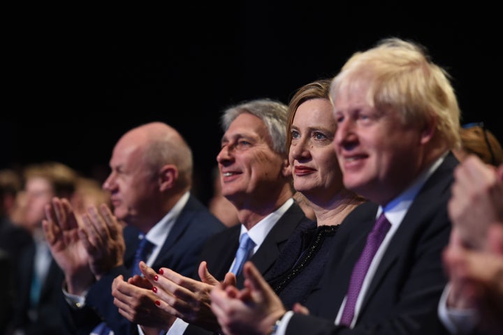 <strong>Amber Rudd sat next to Boris Johnson at the Conservative Party Conference.</strong>