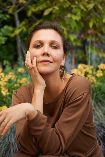 Hesperios crew neck top, $189, available at Hesperios;Paige Novick sculptural earring, $855, available at Paige Novick.