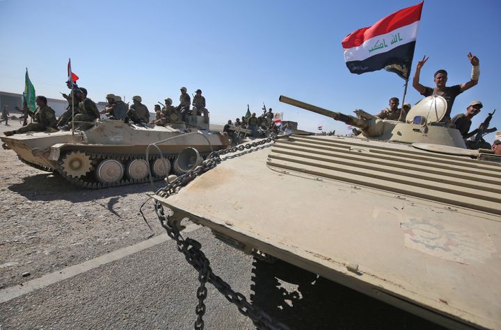 Iraqi forces, backed by fighters from the Hashed al-Shaabi, captured the town of Hawija and the surrounding area from Islamic State.