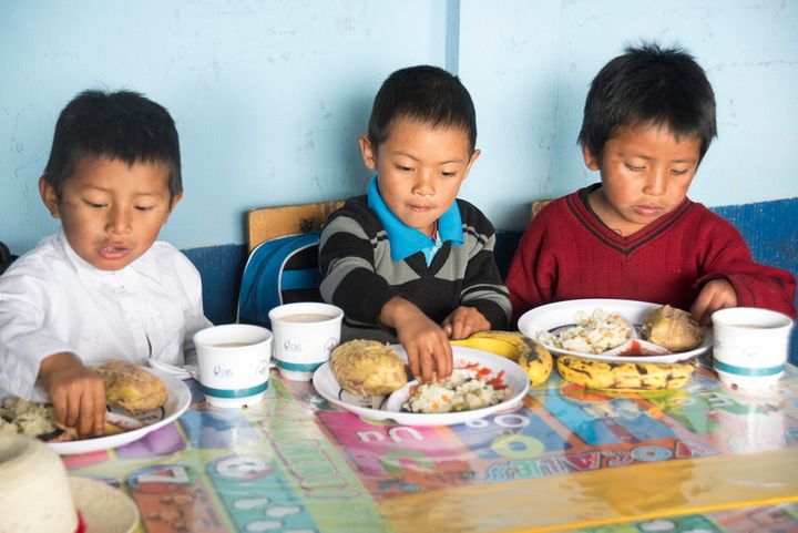  Students of the Paronchaj primary school in Totonicapán, Guatemala, enjoy a school lunch made possible by USDA through CRS as part of the Learning for Life Bilingual Primary Education program. This community is almost entirely comprised of an indigenous population that faces higher rates of poverty and unemployment in Guatemala.