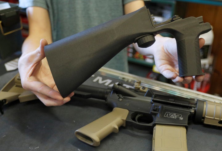 A bump fire stock that attaches to an semi-automatic assault rifle to increase the firing rate is seen at Good Guys Gun Shop
