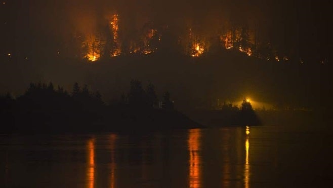 A September wildfire burns in Washington state. In nearby Montana, the state’s worst fire season in years continued to scorch