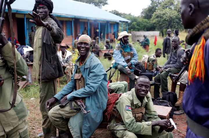 SPLA-IO (SPLA-In Opposition) rebels rest in Yondu, the day before an assault on government SPLA (Sudan People's Liberation Army) soldiers in the town of Kaya, on the border with Uganda, South Sudan, August 25, 2017.