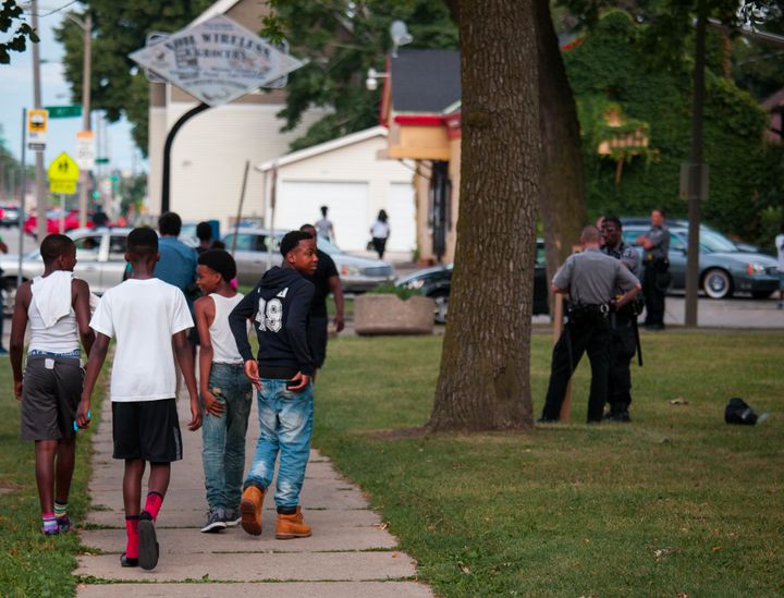 MILWAUKEE, WI - AUGUST 15: Members of the Milwaukee County Sheriff Dept. secure Sherman Park after a 6pm curfew was enacted after a second night of clashes between protestors and police August 15, 2016 in Milwaukee, Wisconsin. Hundreds of angry people have confronted police after an officer shot and killed a fleeing armed man. (Photo by Darren Hauck/Getty Images)