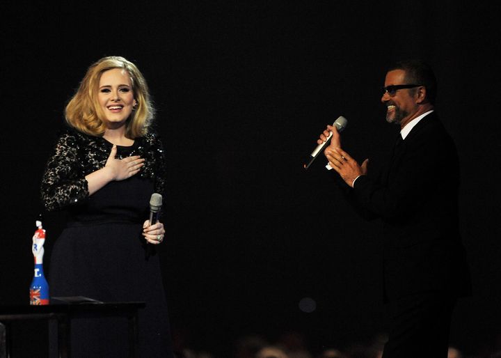 George presented Adele with the Best Album award at the 2012 BRIT Awards. 