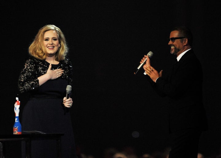 <strong>George presented Adele with the Best Album award at the 2012 BRIT Awards. </strong>