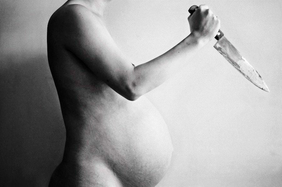 A Pregnant Woman Holds a Symbol of Gender Equality Against the Background  of Her Tummy Stock Image - Image of motherhood, life: 196346397