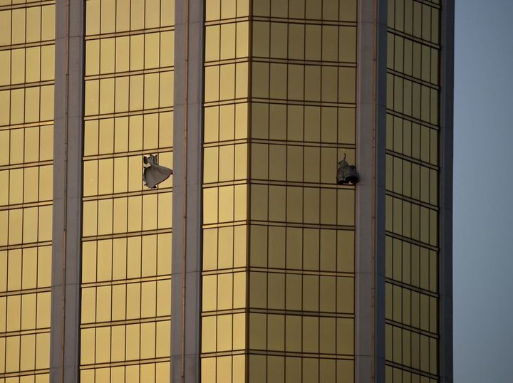 Drapes billow from two broken windows at the Mandalay Bay Resort and Casino on the Las Vegas Strip on Oct 2, 2017.