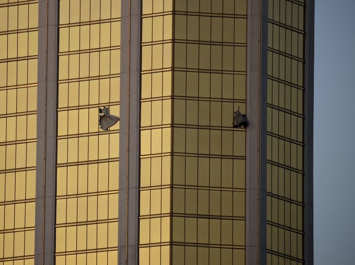 Drapes billow from two broken windows at the Mandalay Bay Resort and Casino on the Las Vegas Strip on Oct 2, 2017.