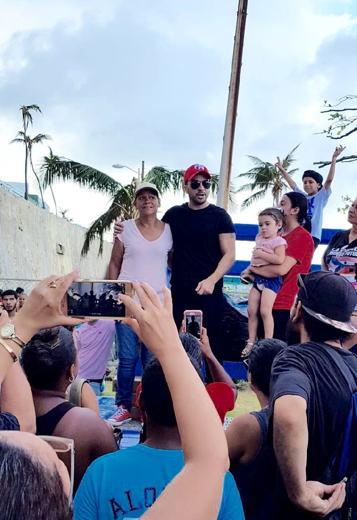 Famed Despacito singer Luis Fonsi made an impromptu visit to the barrio La Perla Monday, promising to lend a hand in rebuilding. 