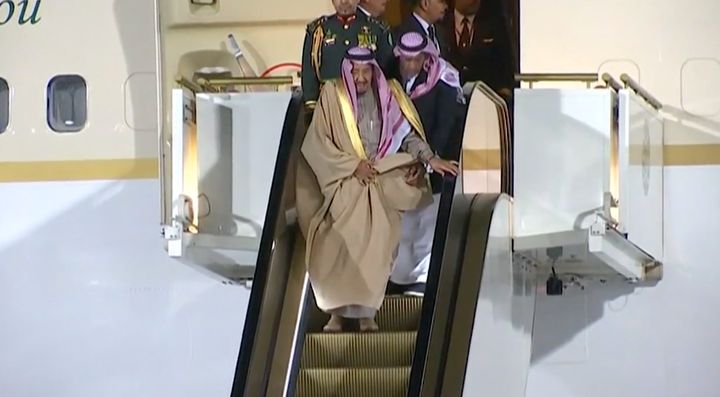 King Salman disembarking a plane in Moscow via his gold escalator 