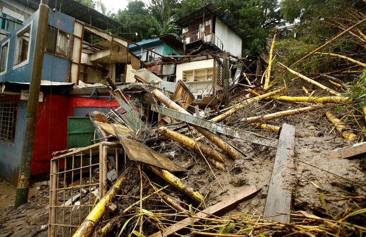 Houses ruined by a mudslide during tropical storm Nate in San Jose, Costa Rica 