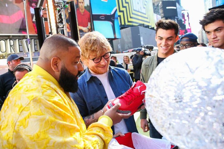 DJ Khaled, Ed Sheeran, Ethan Dalton and Grayson Dalton view Nike Air Jordan sneakers during the MTV TRL Kick-Off at Times Square on October 2, 2017 in New York City. 