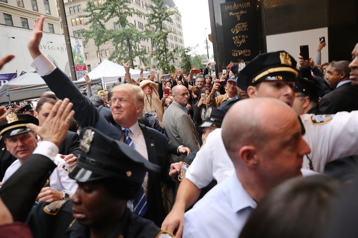 Donald Trump greets supporters outside Trump Tower on Oct. 8, 2016.