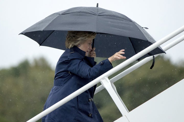 Hillary Clinton boards her campaign plane in White Plains, N.Y., on Oct. 9, 2016, to travel to St. Louis for the second presidential debate.