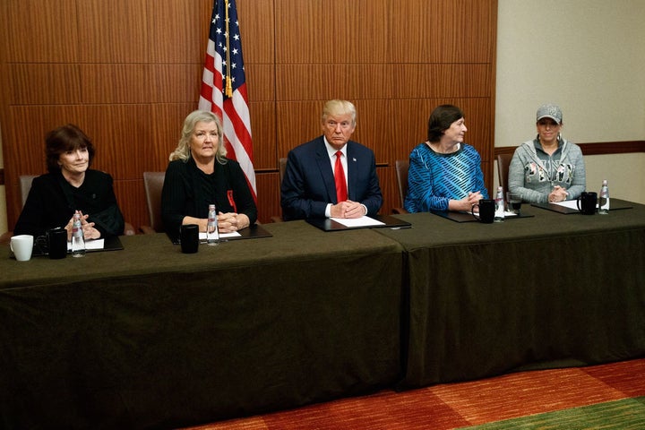 Trump sits with, from left, Kathleen Willey, Juanita Broaddrick, Kathy Shelton and Paula Jones on Oct. 9, 2016, before the second presidential debate.